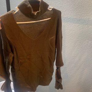 olive sweater with zipper detailed opening on the sleeve (at elbow)